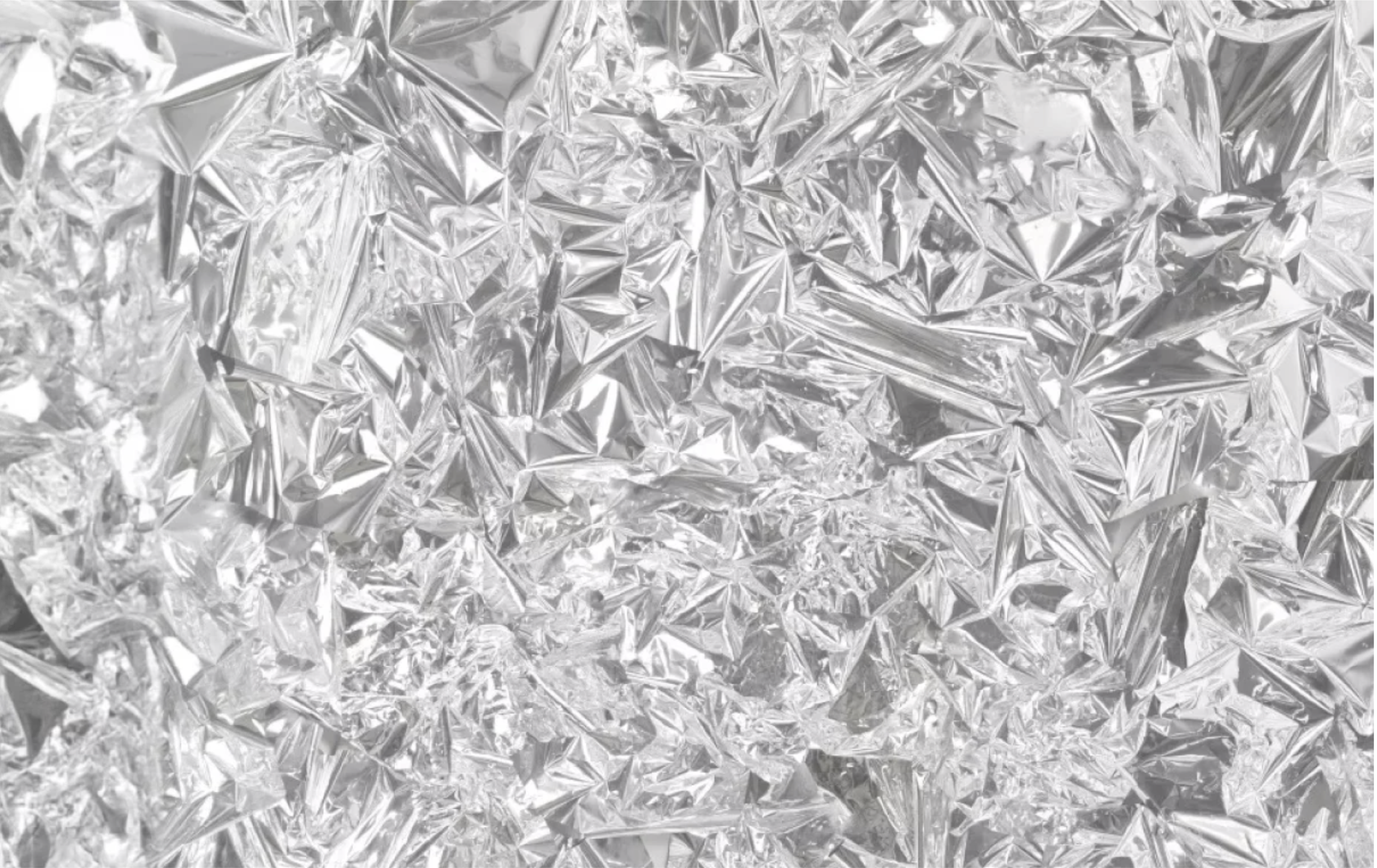 Silver crumpled metallic foil texture