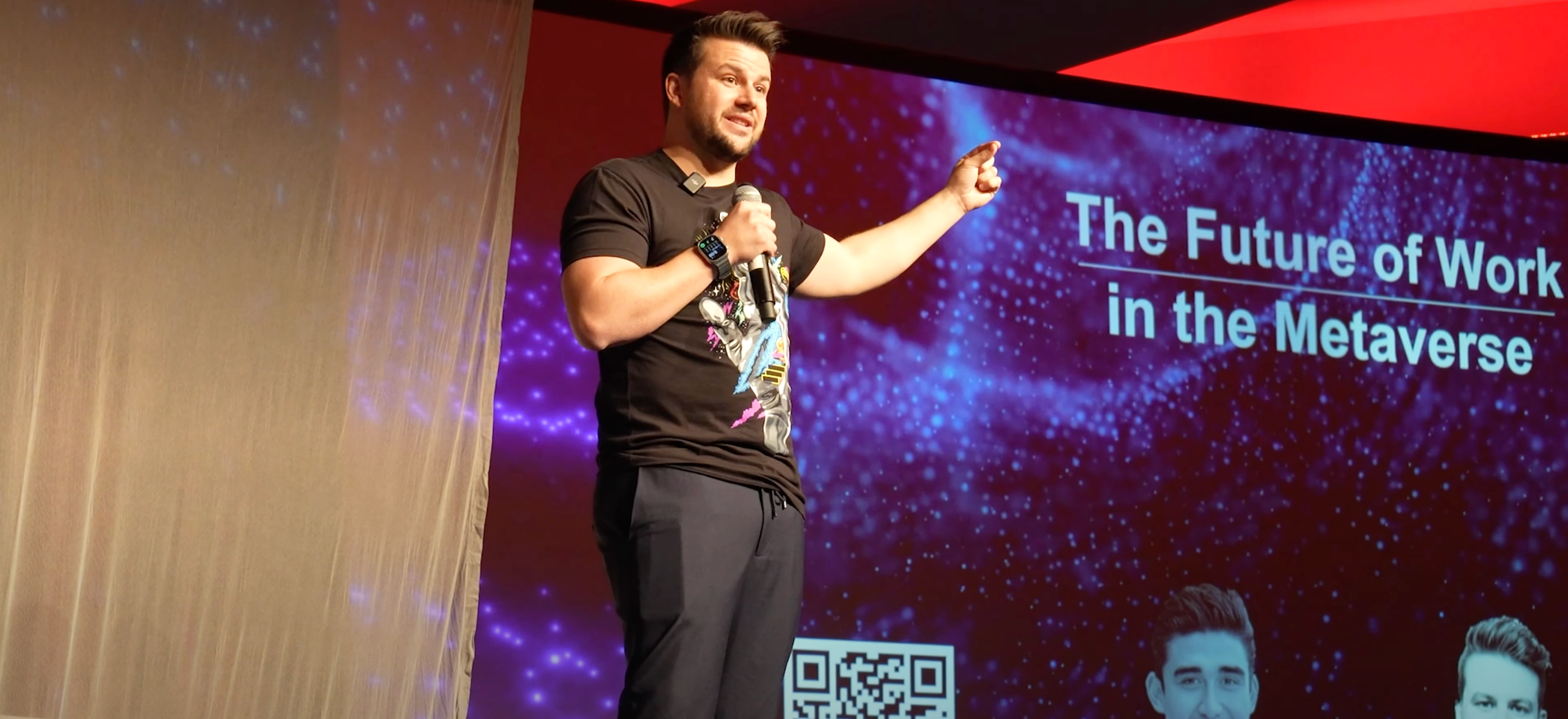 Josh Drean speaking on stage