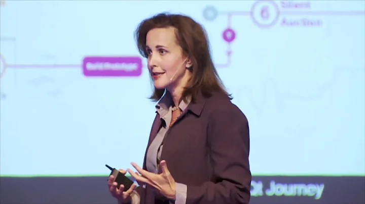 Woman presenting process diagram on stage