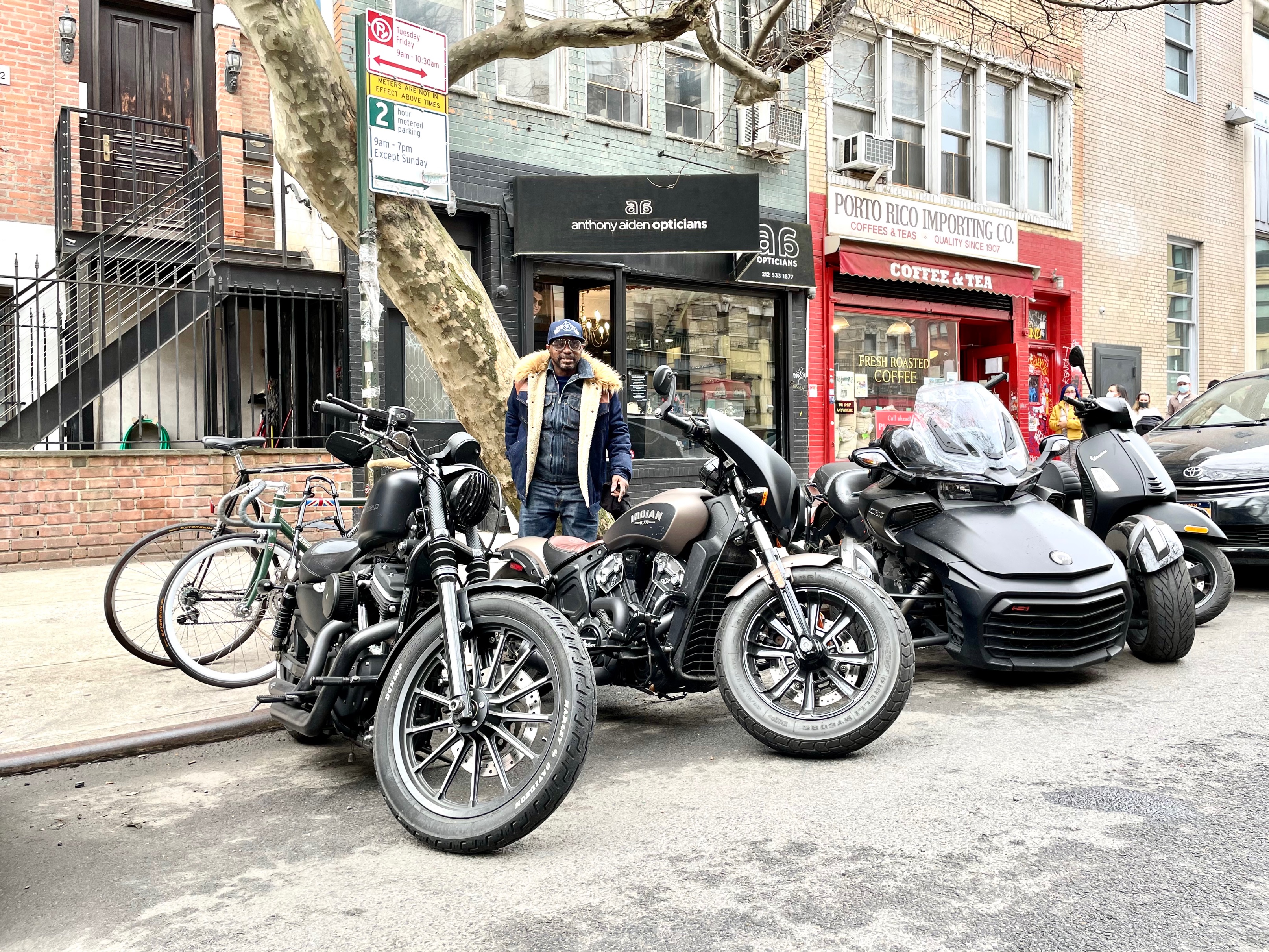 The Anthony Aiden Opticians shopfront on St. Marks Place with motorcycles parked at the curb