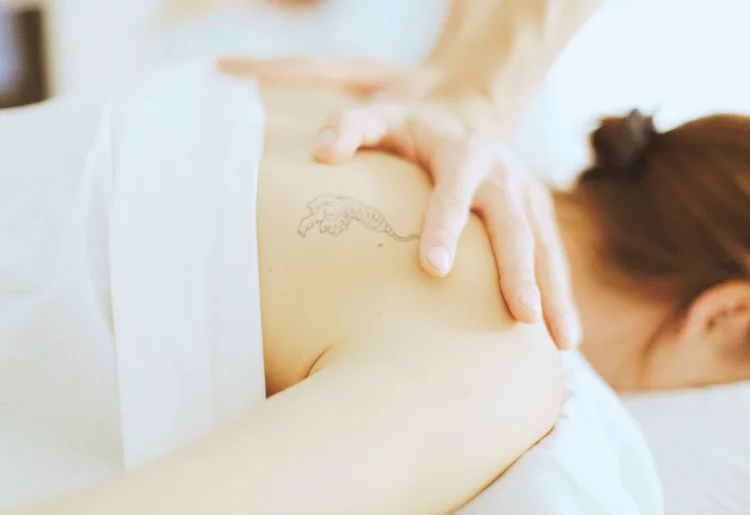 Close-up of therapeutic bodywork during a massage at Center Yoga