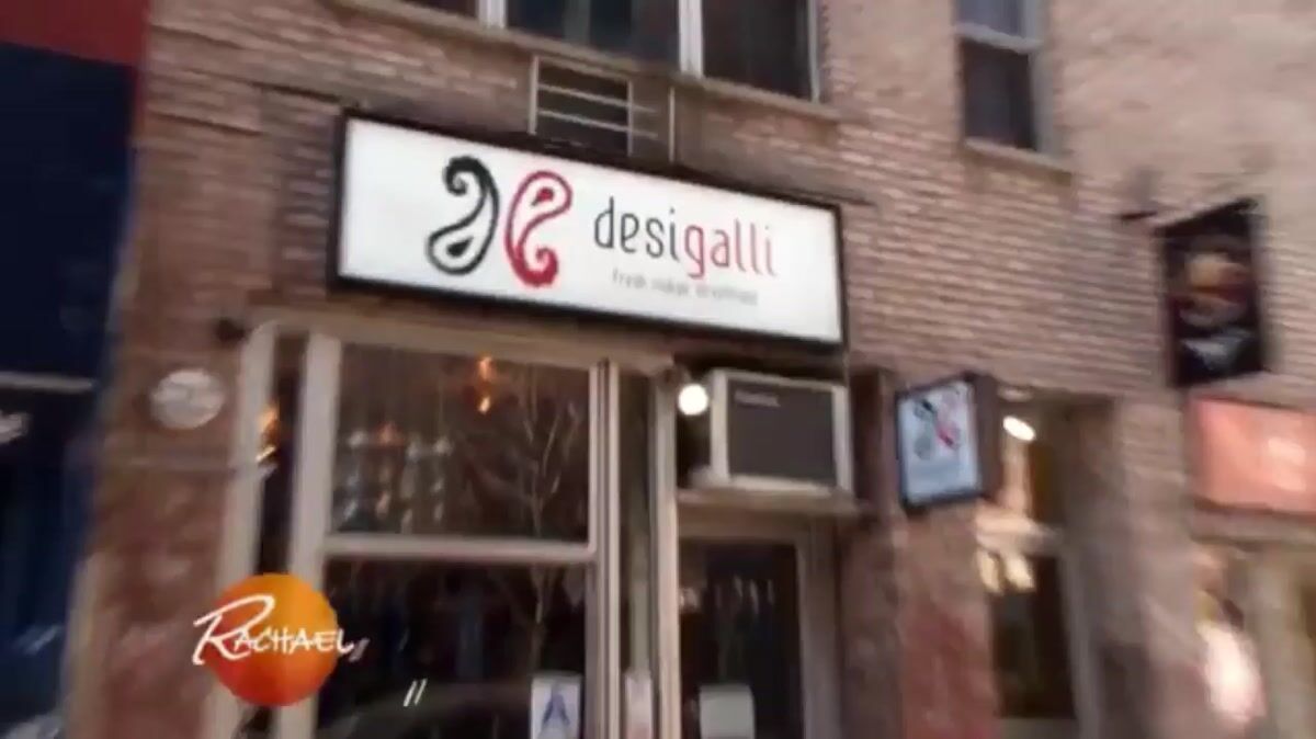 Daytime exterior of the Desi Galli storefront in New York City with signage reading desigalli fresh indian street food