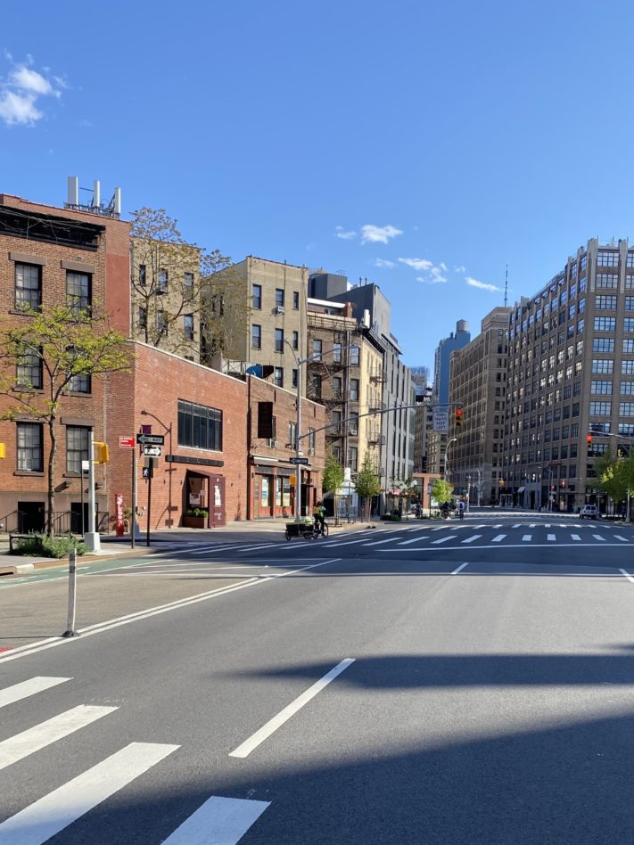 The West Village street corner around DOGMA, with low brick buildings