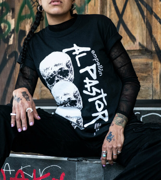 A guest wearing an Empellón Al Pastor t-shirt.