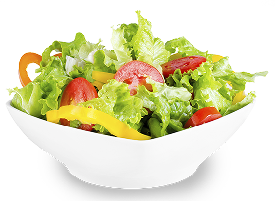 Bowl of mixed green salad with tomatoes, yellow peppers and radishes