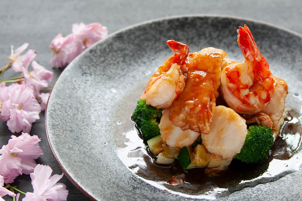 Glazed shrimp and scallop dish with broccoli