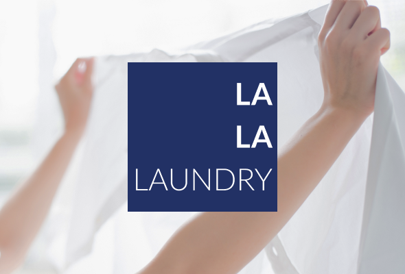 La La Laundry panel — hands holding a white sheet with the La La Laundry logo