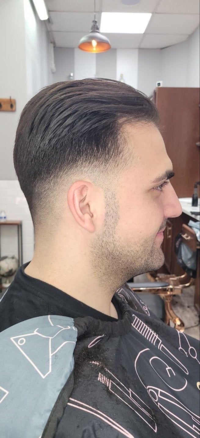 Client profile with a slicked-back fade