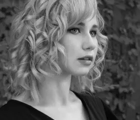 Portrait of a client with styled blonde hair