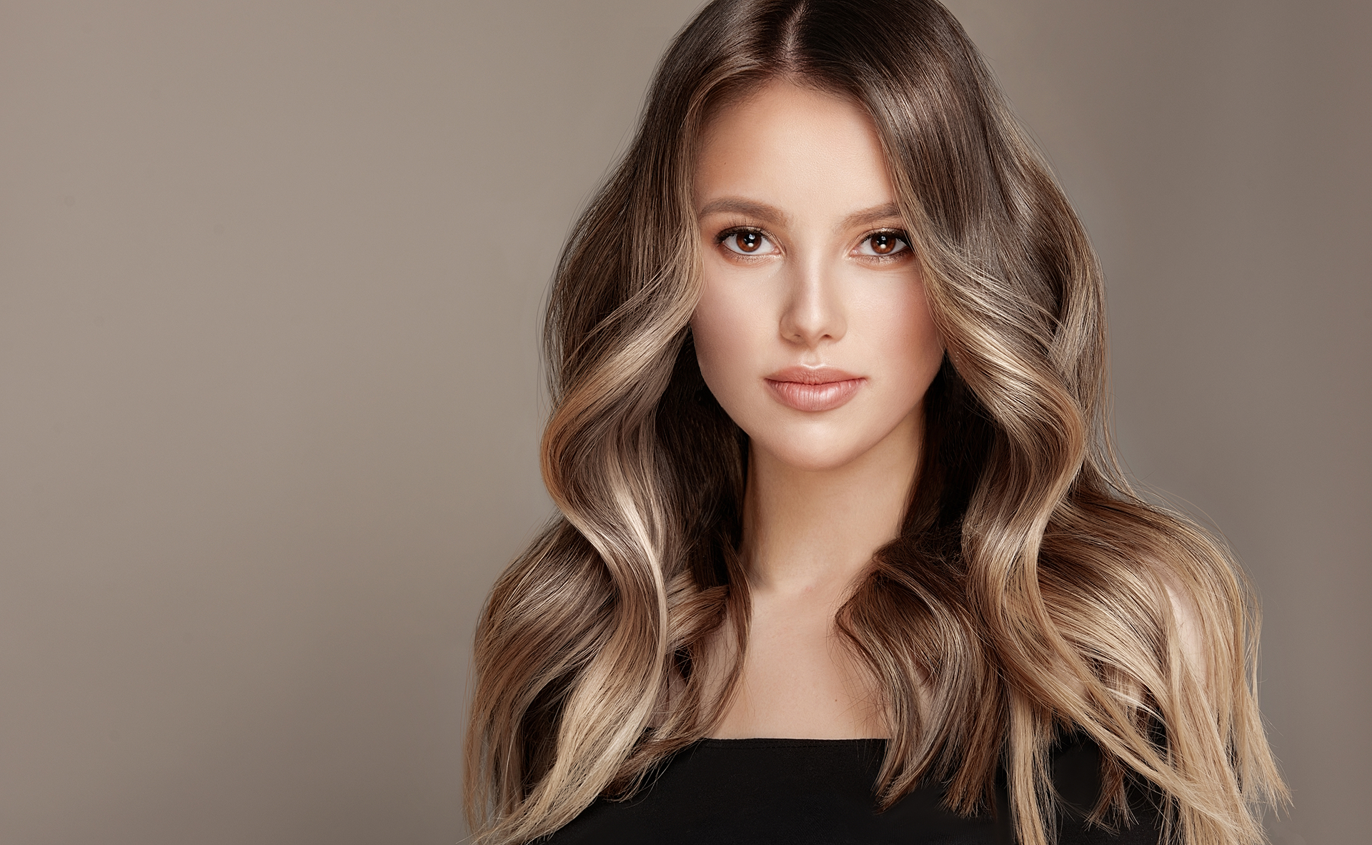Client with long wavy brunette balayage hair styled at Shear Bliss NYC