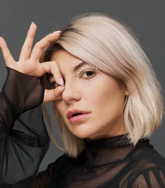 Portrait of a woman with a platinum blonde bob