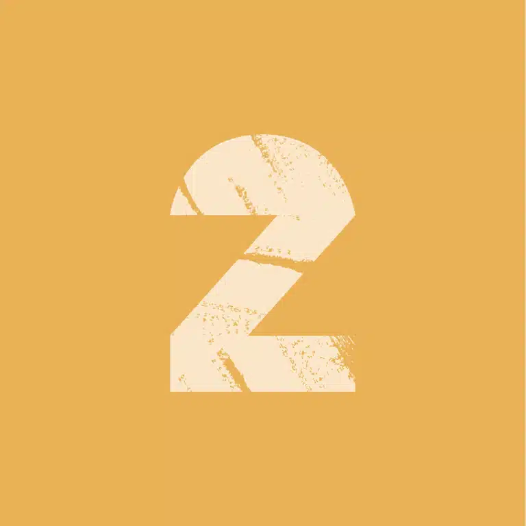 Golden square with a distressed numeral two marking WYLD's two-year anniversary