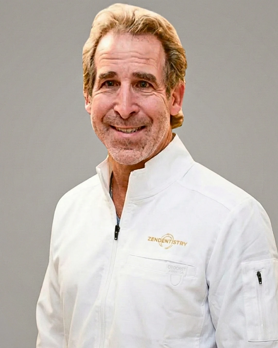 Zen Dentistry dentist in branded white lab coat