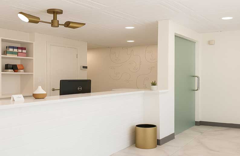 East Village reception with face-art mural