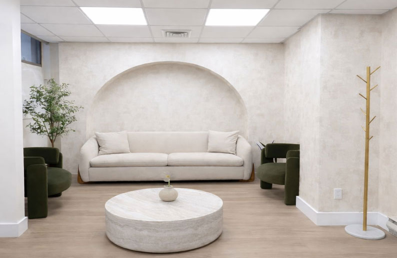 Upper West Side waiting room with arch niche and sofa