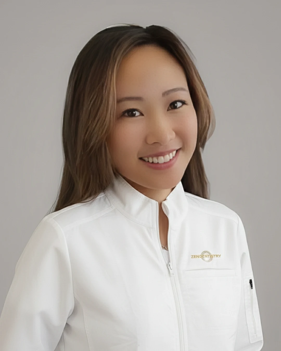 Zen Dentistry provider in branded white lab coat