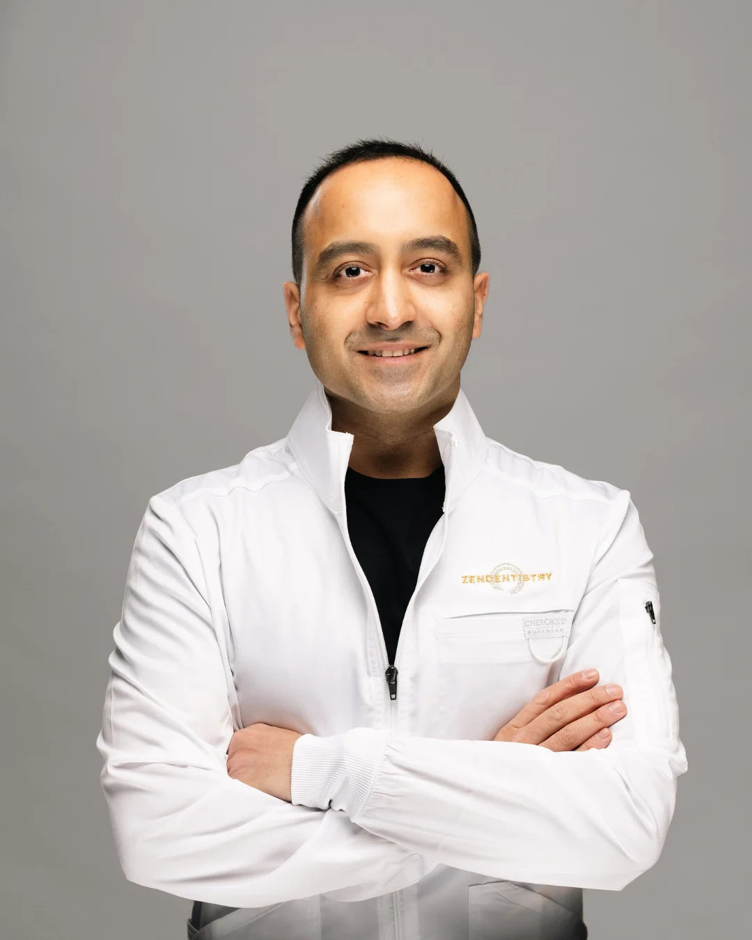 Zen Dentistry dentist in branded white lab coat