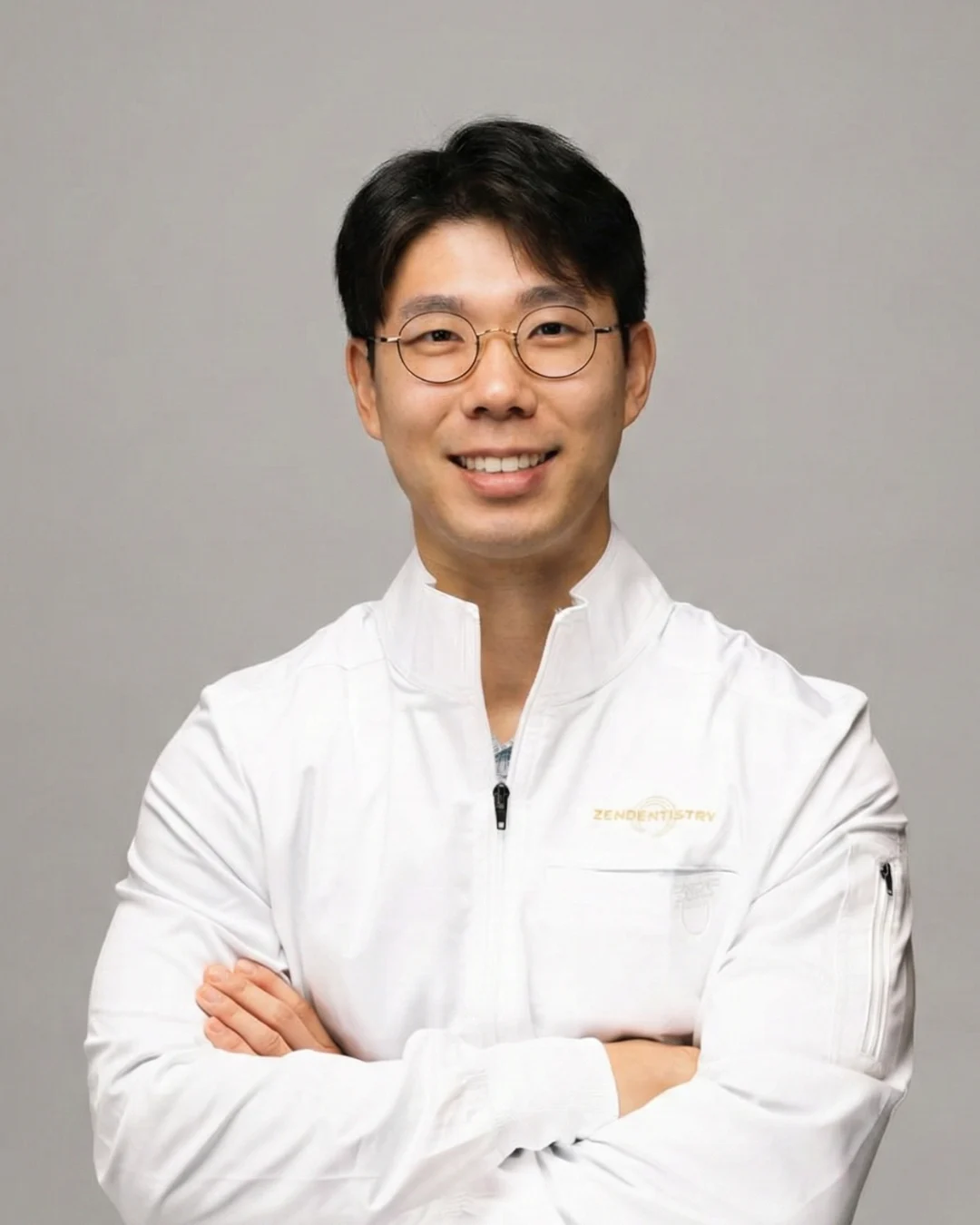Zen Dentistry dentist in branded white lab coat