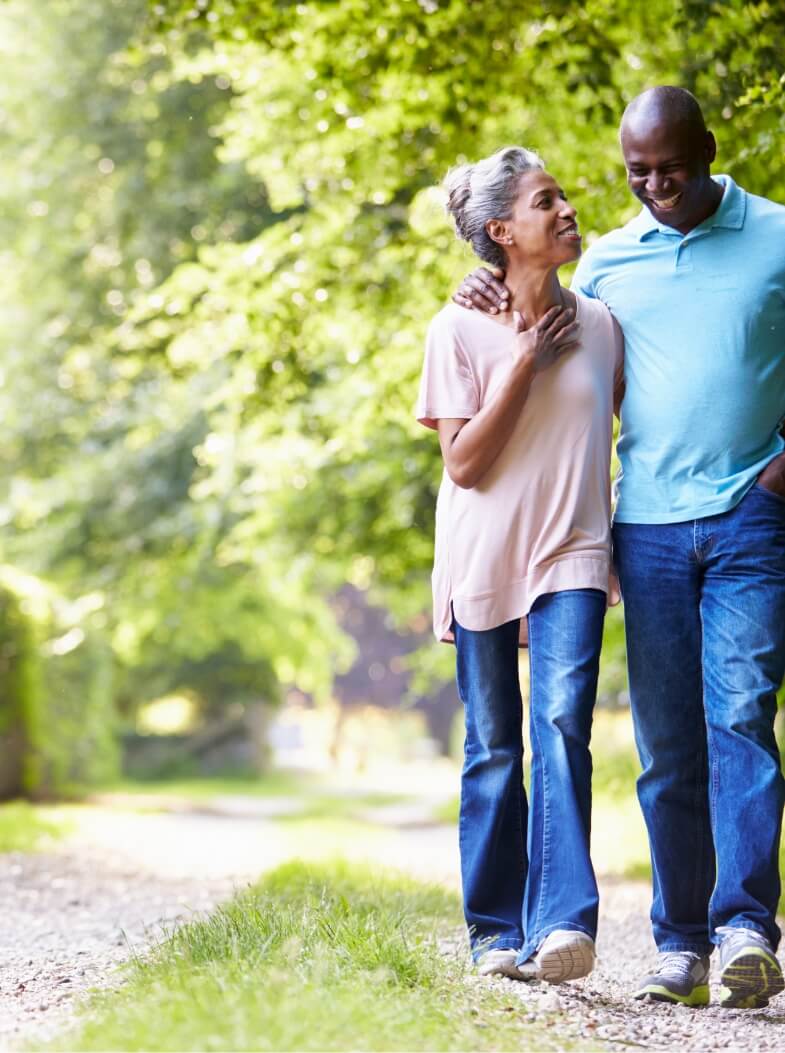 A couple walking outdoors